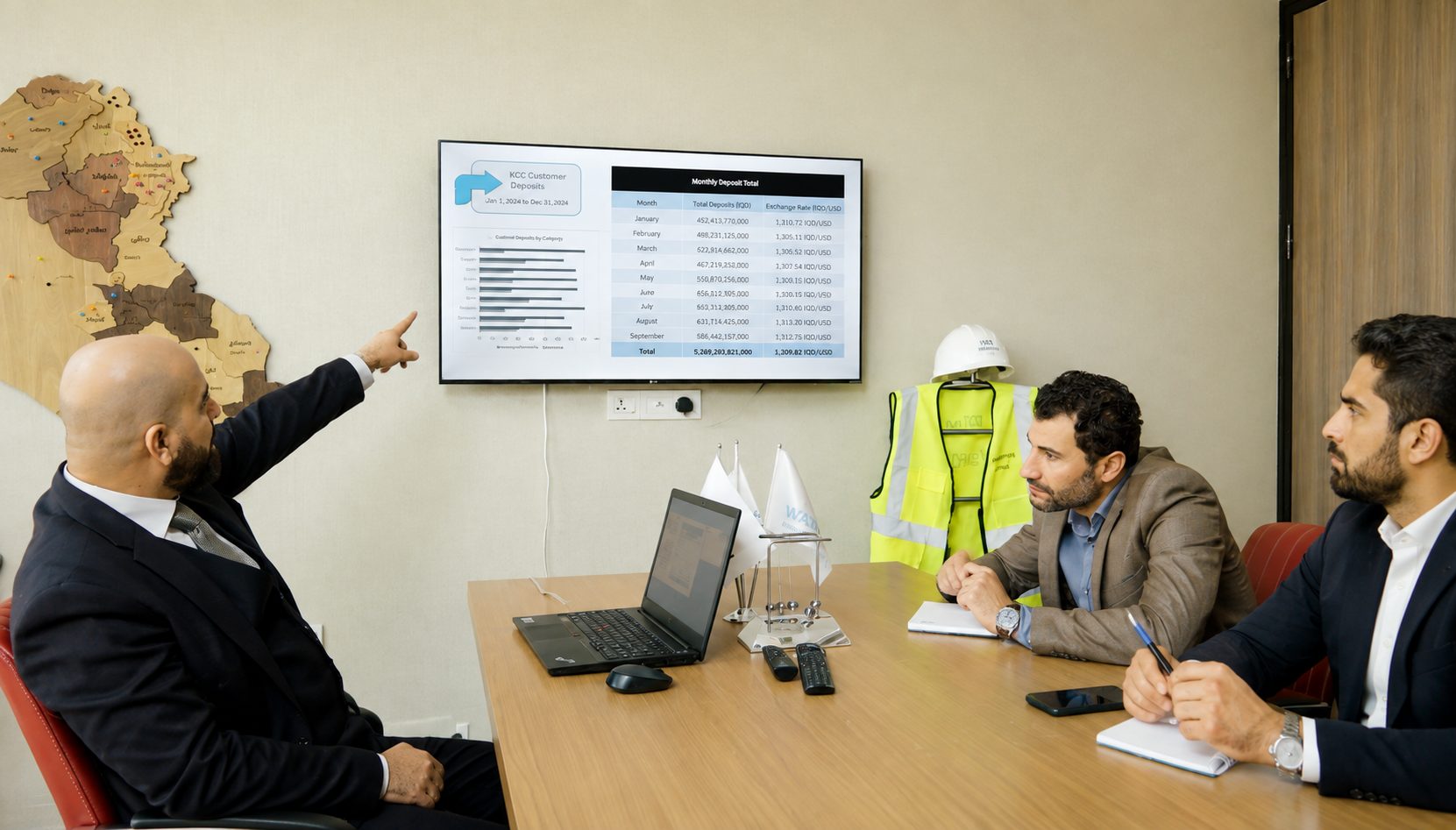 Colleagues collaborating in a conference room presentation