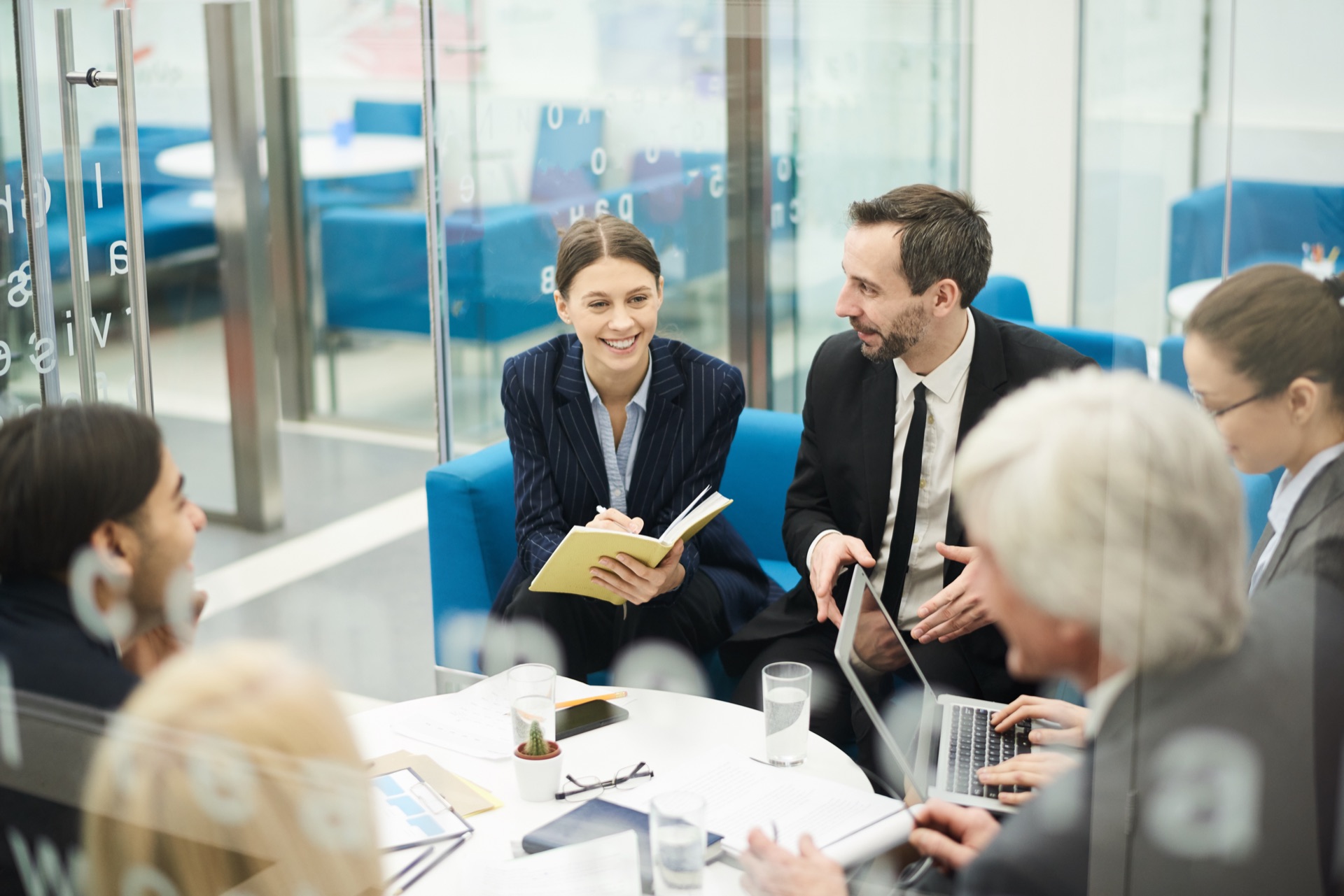 Wataniya Group colleagues in a working session